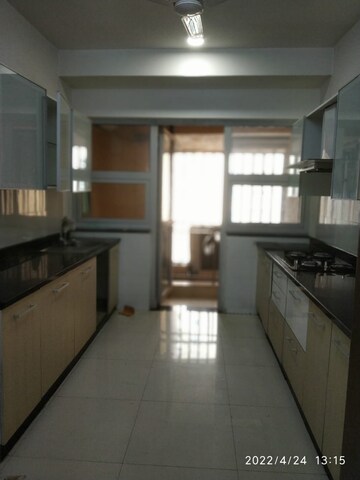 Kitchen in 3 BHK Apartment at DB Realty Orchid Woods, Goregaon East – for Rent