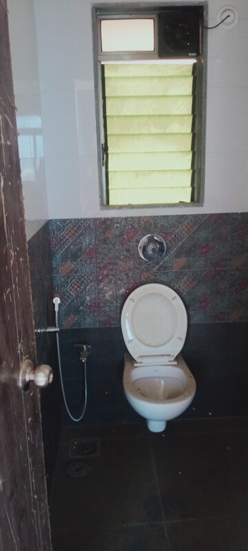 Bathroom in 1 BHK Apartment at Bindra Sateri Legacy, Andheri East – for Rent