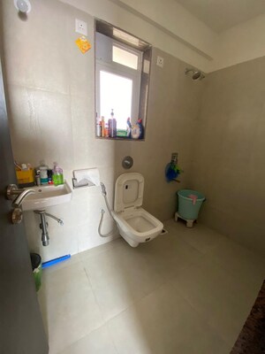 Bathroom in 2 BHK Apartment at Puraniks City Reserva, Ghodbunder Road – for Rent