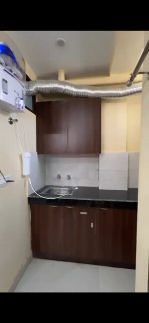 Kitchen in 1 RK Builder Floor at RWA Residential Society, Sector 40 – for Rent