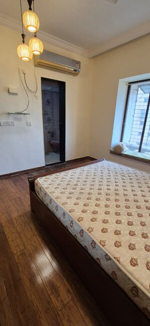 Bedroom in 2 BHK Apartment at Golden Isle, Goregaon East – for Rent