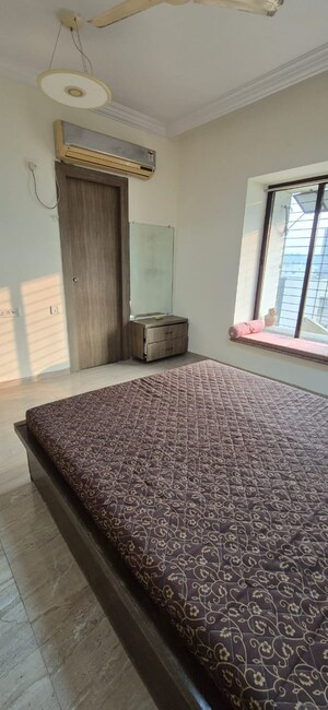 Bedroom in 2 BHK Apartment at Golden Isle, Goregaon East – for Rent