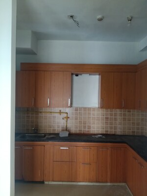 Kitchen in 2.5 BHK Apartment at Mahagun Mywoods, Sector 16c Greater Noida – for Sale