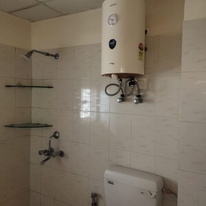 Bathroom in 2 BHK Apartment at Emenox Brave Hearts, Raj Nagar Extension – for Rent