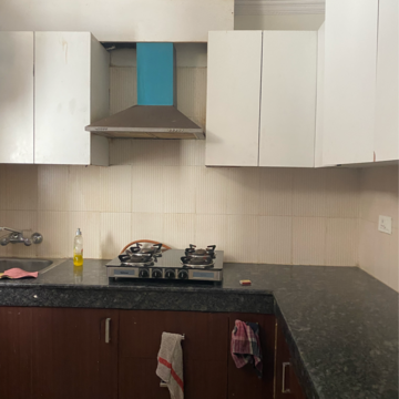 Kitchen in 2 BHK Apartment at Maya Garden City, Nagla Road – for Rent