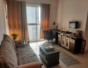 Living Room in 1 BHK Apartment at Lodha Upper Thane Meadows, Anjur – for Rent