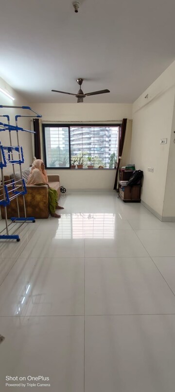 Living Room in 1 BHK Apartment at Manavsthal Heights, Andheri East – for Sale