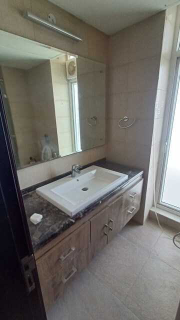 Bathroom in 3 BHK Apartment at Mahindra Luminare, Sector 59 – for Rent