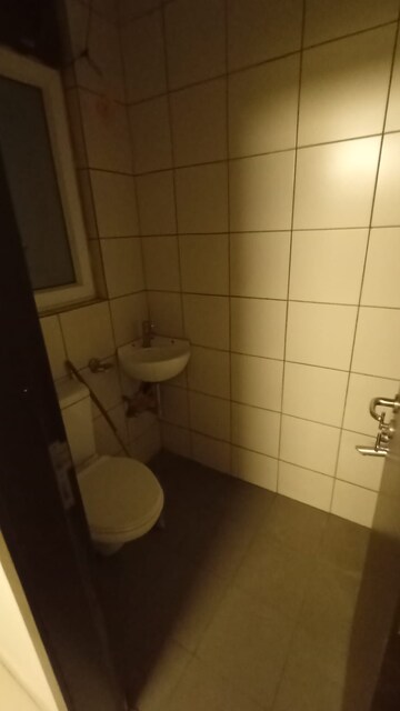 Bathroom in 3 BHK Apartment at Mahindra Luminare, Sector 59 – for Rent