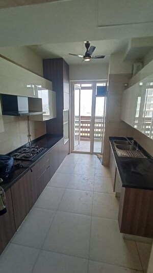 Kitchen in 3 BHK Apartment at Mahindra Luminare, Sector 59 – for Rent