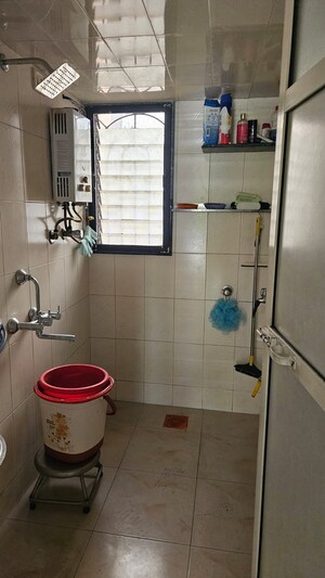Bathroom in 3 BHK Apartment at Satya Vandan CHS, Kailash Nagar – for Rent