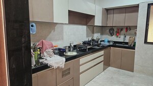 Kitchen in 3 BHK Apartment at Satya Vandan CHS, Kailash Nagar – for Rent