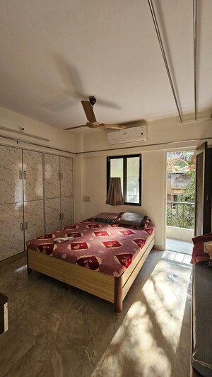 Bedroom in 3 BHK Apartment at Satya Vandan CHS, Kailash Nagar – for Rent