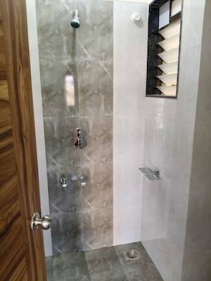 Bathroom in 1 BHK Apartment at Puraniks Kanchanpushp Complex, Kavesar – for Rent