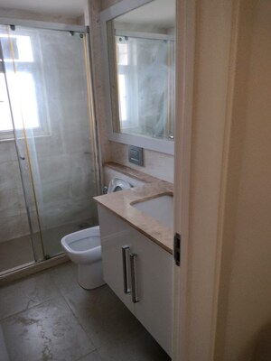 Bathroom in 3 BHK Apartment at Haiderpur – for Rent