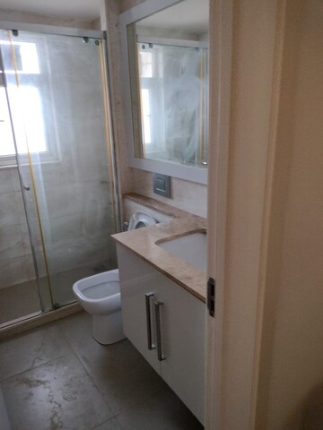 Bathroom in 3 BHK Apartment at Haiderpur – for Rent