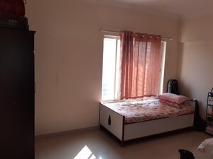 Bedroom in 2.5 BHK Apartment at GK Rose County, Pimple Saudagar – for Rent