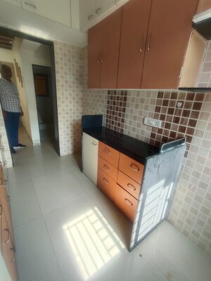 Kitchen in 2 BHK Apartment at Om Sai Plaza, Ghodbunder Road – for Rent