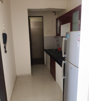 Kitchen in 1 BHK Apartment at Cosmos Orchid, Ghodbunder Road – for Rent