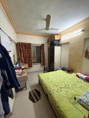 Bedroom in 2 BHK Apartment at GK Rose County, Pimple Saudagar – for Rent