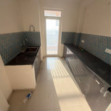 Kitchen in 3 BHK Apartment at Cosmos Express 99, Gopalpur – for Sale