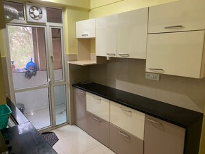 Kitchen in 2 BHK Apartment at Hiranandani Meadows, Manpada – for Rent