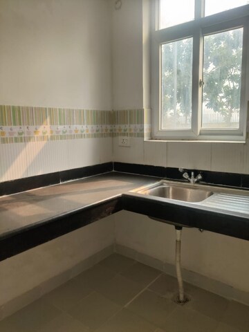 Kitchen in 3 BHK Apartment at Auric City Homes, Sector 82 – for Sale