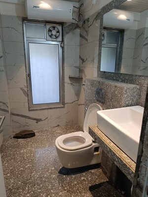 Bathroom in 2 BHK Apartment at Kalpataru Hills Phase II, Manpada – for Rent