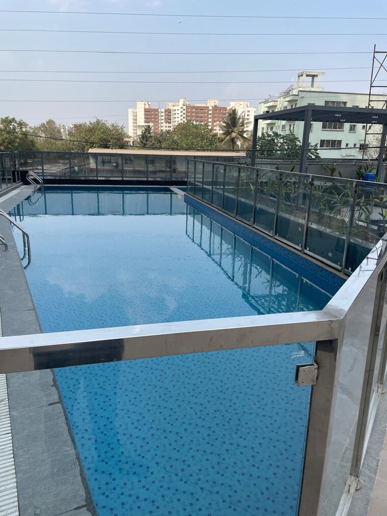 Swimming Pool, amanora-elivate-tower 3 Bedroom 1400 Sq.Ft. Apartment In Hadapsar Pune 10016545