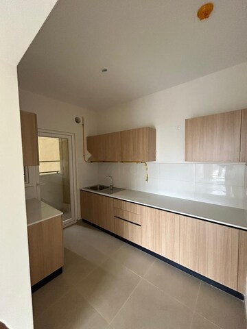 Kitchen in 2 BHK Apartment at Bhartiya City Nikoo Homes 4, Thanisandra Main Road – for Rent