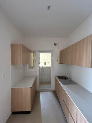 Kitchen in 2 BHK Apartment at Bhartiya City Nikoo Homes 4, Thanisandra Main Road – for Rent