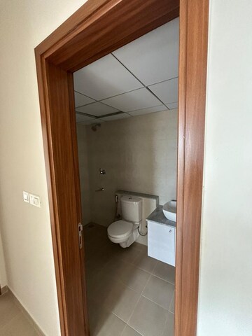 Bathroom in 2 BHK Apartment at Bhartiya City Nikoo Homes 4, Thanisandra Main Road – for Rent