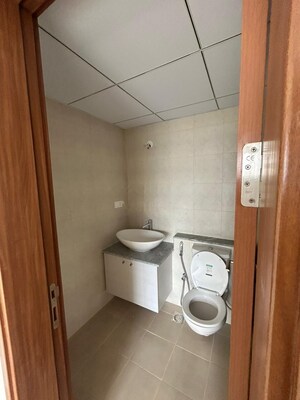 Bathroom in 2 BHK Apartment at Bhartiya City Nikoo Homes 4, Thanisandra Main Road – for Rent