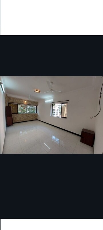 Living Room in 1 BHK Apartment at Bandra West – for Rent