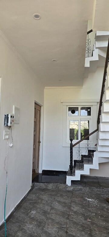 Staircase in 2 BHK Apartment at Ansal Sushant Golf city, Sushant Golf City – for Rent