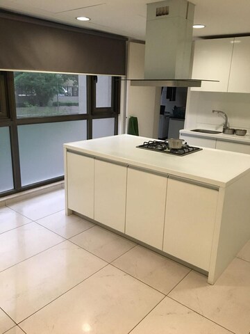 Kitchen in 4 BHK Apartment at Panchshil One North, Magarpatta City – for Rent