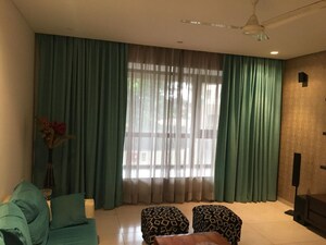 Living Room in 4 BHK Apartment at Panchshil One North, Magarpatta City – for Rent