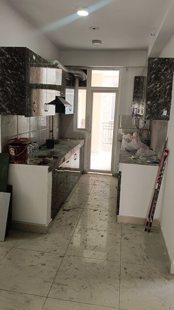 Kitchen in 3.5 BHK Apartment at Ajnara Le Garden, Sector 16b Greater Noida – for Rent