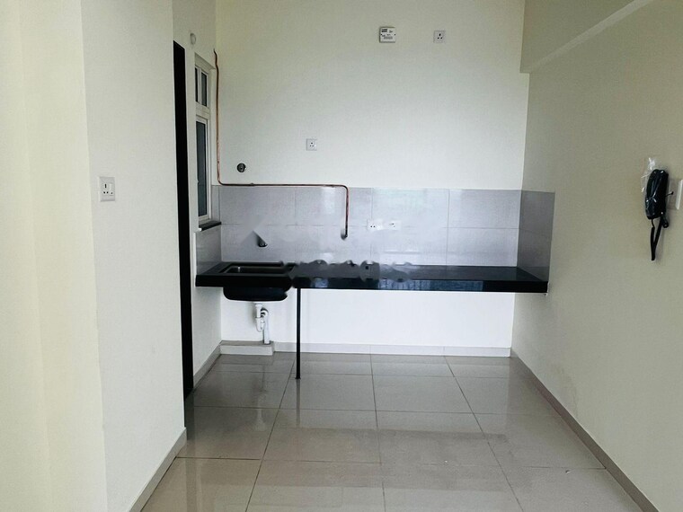 Kitchen, kolte-patil-life-republic-atmos 2 Bedroom 819 Sq.Ft. Apartment In Hinjewadi Pune 10016678