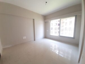 Room in 2 BHK Apartment at Swapnalok Towers, Malad East – for Rent