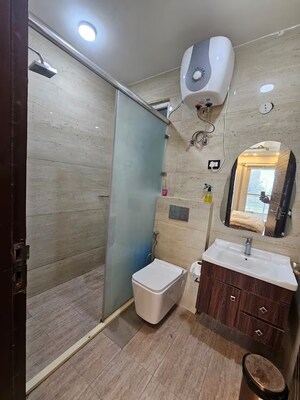 Bathroom in 4 BHK Apartment at Ansal API Versalia, Sector 67a – for Rent