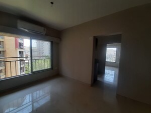 Room in 2 BHK Apartment at Swapnalok Towers, Malad East – for Rent