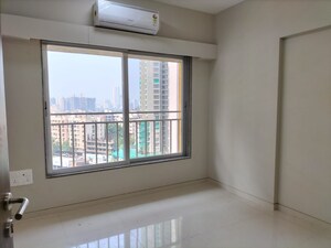 Room in 2 BHK Apartment at Swapnalok Towers, Malad East – for Rent