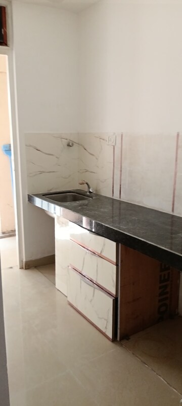 Kitchen in 2 BHK Apartment at DB Orchid Ozone, Dahisar East – for Sale