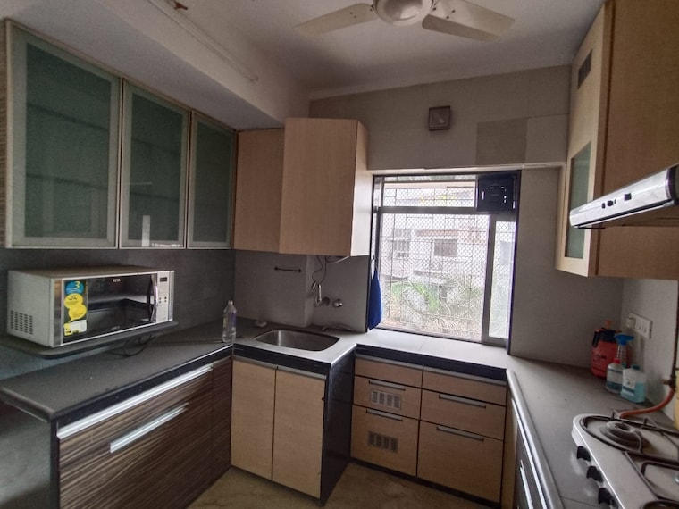 Kitchen, supreme-19 4 Bedroom 1250 Sq.Ft. Apartment In Lokhandwala Mumbai 10017394