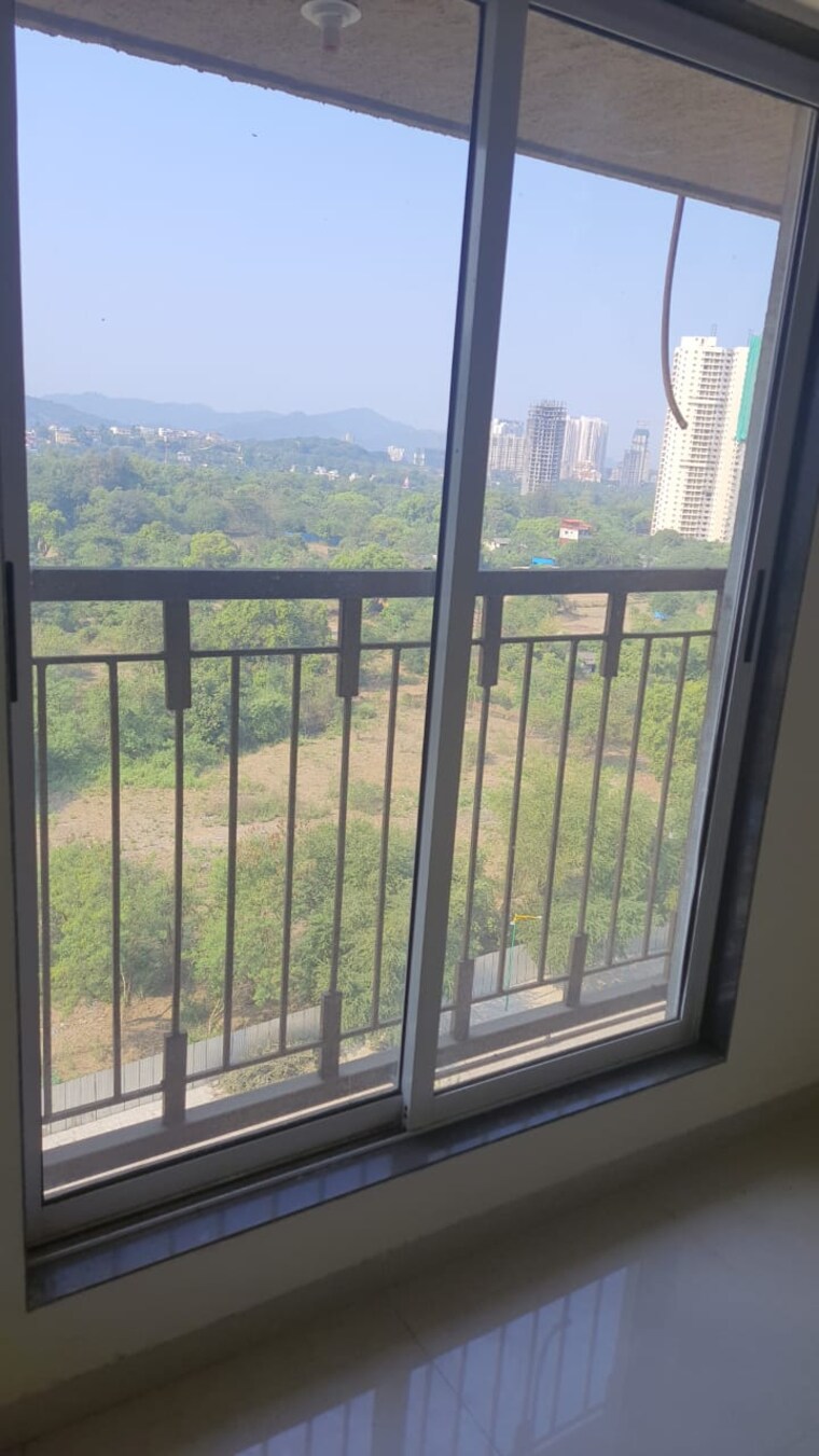 Balcony, cosmos-county-ii 2 Bedroom 850 Sq.Ft. Apartment In Ghodbunder Road Thane 10017408