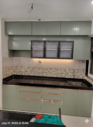 Kitchen in 2 BHK Apartment at Mahavir Square, Manpada – for Rent