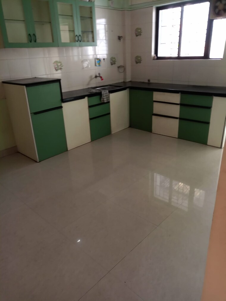 Kitchen, alkapuri society 2 Bedroom 680 Sq.Ft. Apartment In Alkapuri Society Pune 10017469