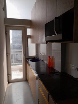Kitchen in Studio Apartment at Sarvottam Nx One, Tech Zone 4 Greater Noida – for Rent