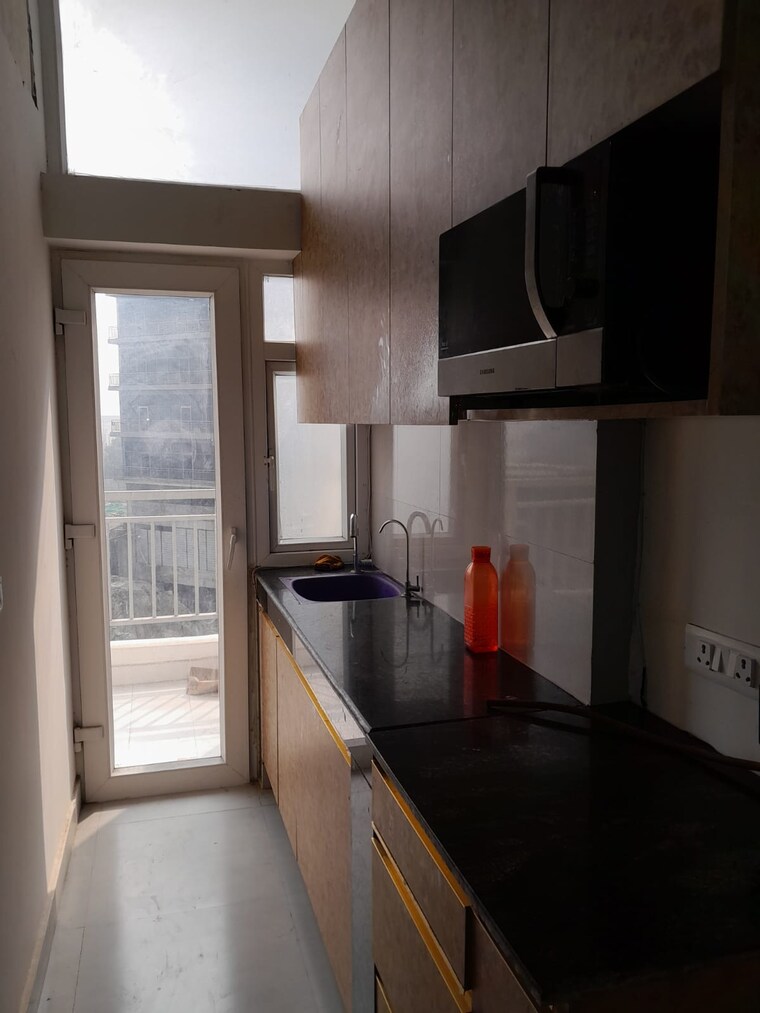 Kitchen, sarvottam-nx-one Studio 600 Sq.Ft. Apartment In Tech Zone 4 Greater Noida Greater Noida 10017653
